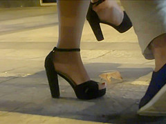 Hot Feet In High Heels Under A Bench