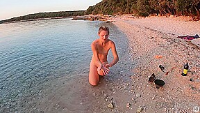 Hot Ginger Professional Fire Dancer Lea Playing With Her Flames On The Beach During Sunset