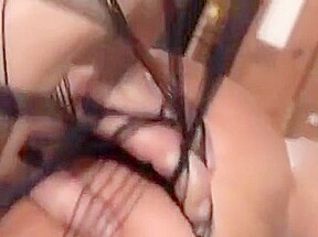 Hot Oriental chick in stockings fucks on bed