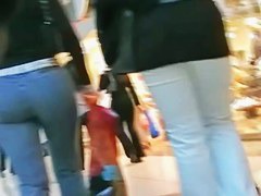 Hot brunette w/ a nice ass in a voyur porno pacing in a shopping mall