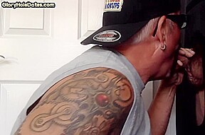 Inked gloryhole DILF sucks cock till jizz in greedy mouth