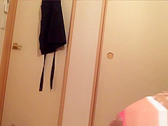 Japanese peeing in cup