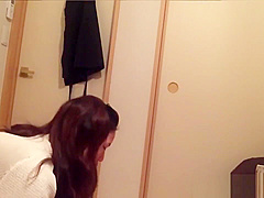 Japanese peeing in cup