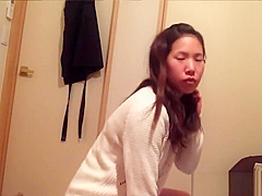 Japanese peeing in cup