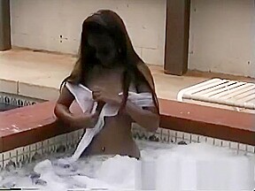 Joanne Rachel is outside strutting her stuff in and out of the pool