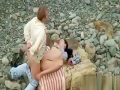 Kinky amateur couple having hardcore sex on the beach