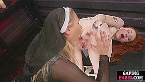 Lesbian nun enjoys anal masturbation with redhead babe