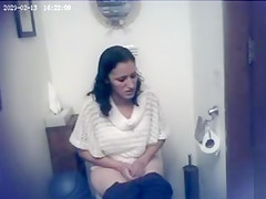 Lovely sweater on a cute woman going to the toilet