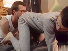 Lusty stepdad fingers a twink before bare impaling doggy
