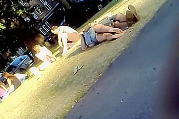 Lying in the park teen 18+ gets her jeans upskirt