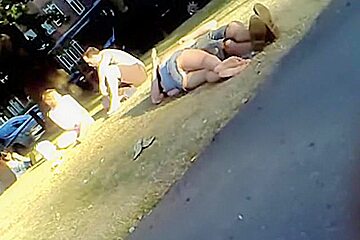 Lying in the park teen 18+ gets her jeans upskirt