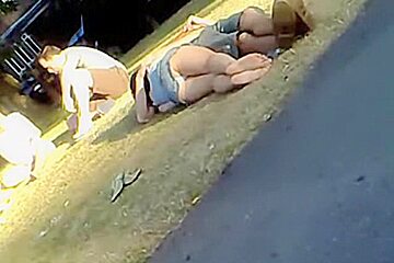 Lying in the park teen 18+ gets her jeans upskirt