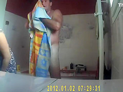 Mature couple spied showering together