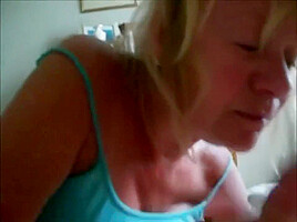 Mature wife gives a Blowjob