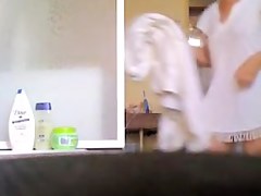 Milf with fatty belly and bushy cunt showering on