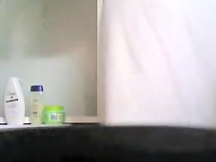 Milf with fatty belly and bushy cunt showering on