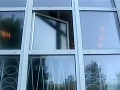 Naughtiest chick ever takes a piss from a window!