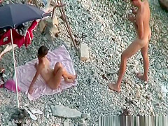 Nude woman gently blows penis