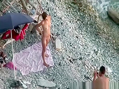 Nude woman gently blows penis