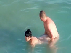 Nudists fucking in the water