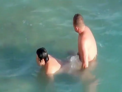 Nudists fucking in the water