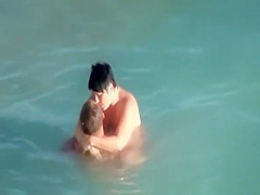Nudists fucking in the water