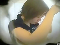 Petite asian girl under a shower
