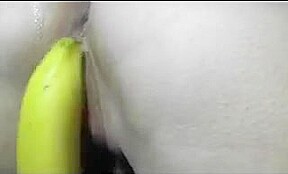 Pierced amateur wife with banana and fingers in her pussy