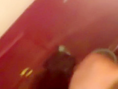 Poor woman spied while washing up