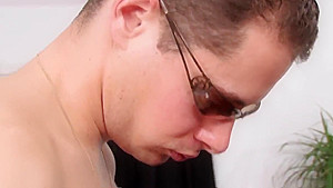 Raven haired slut gets ridden doggy style on black leather sofa