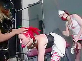 Redhead Slut Bonded And Spanked By Lezzies