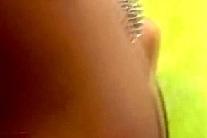 Redhead T-girl in see through dress enjoys her banana rama