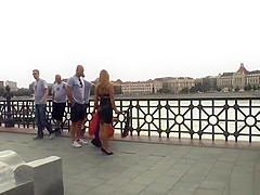 Redhead slut gets gangbang in public