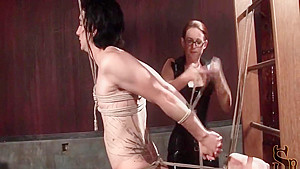 Roped male sex slave gets horny shaft tortured