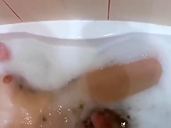 Russian Girl Takes A Bath With A Plug In The Ass