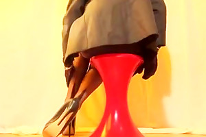 SEXYPUTA WEARING BLACK MINI SKIRT AND BLACK SEAMED NYLON STOCKINGS
