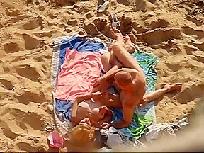 SPY HIDDEN ON THE BEACH