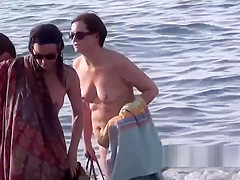 Seaside Nudist Milfs Enjoying The Warm Water And Sun