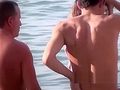 Seaside Nudist Milfs Enjoying The Warm Water And Sun
