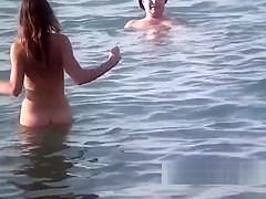 Seaside Nudist Milfs Enjoying The Warm Water And Sun