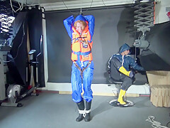 See Ronja Tied And Gagged By Stella In Shiny Nylon Rainwear And A Life Vest!