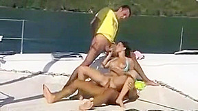 Sexy Babe Sucking and Fucking Two Guys at the Same Time