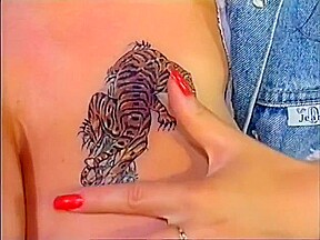 Sexy Tigress Shows Her Huge Tits And Has Some DP Dildo Action