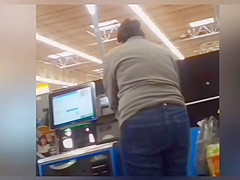 Sexy ass on brunnete milf in jeans at self checkout