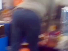 Sexy ass on brunnete milf in jeans at self checkout