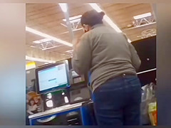 Sexy ass on brunnete milf in jeans at self checkout
