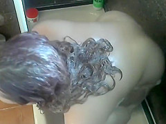 Sexy chubby chick enjoys a dildo in the tub