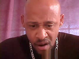 Sexy ebony deep throats a big dick and gets both holes fucked