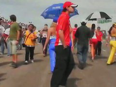 Sexy models get recorded by a candid cam on a racing track