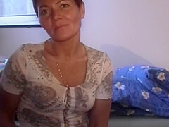 Short Haired German Lady Pleasing Her Hairy Muff With A Dildo